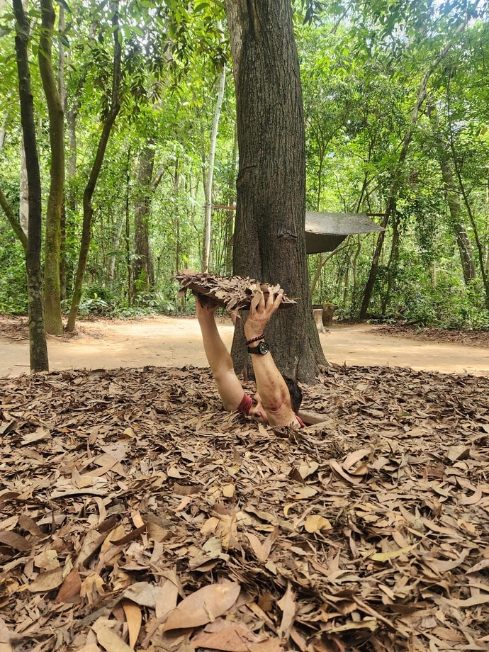 The author emerging from the Củ Chi Tunnels near Saigon